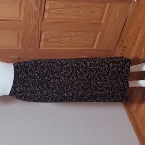 Midi floral Briggs new york skirt. No size tag but it measures 14in on the waist